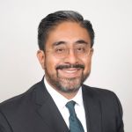 Salvador Elías Venegas Andraca, Ph.D. A middle-age man, Salvador Elías Venegas Andraca, Ph.D., with glasses and smiling.